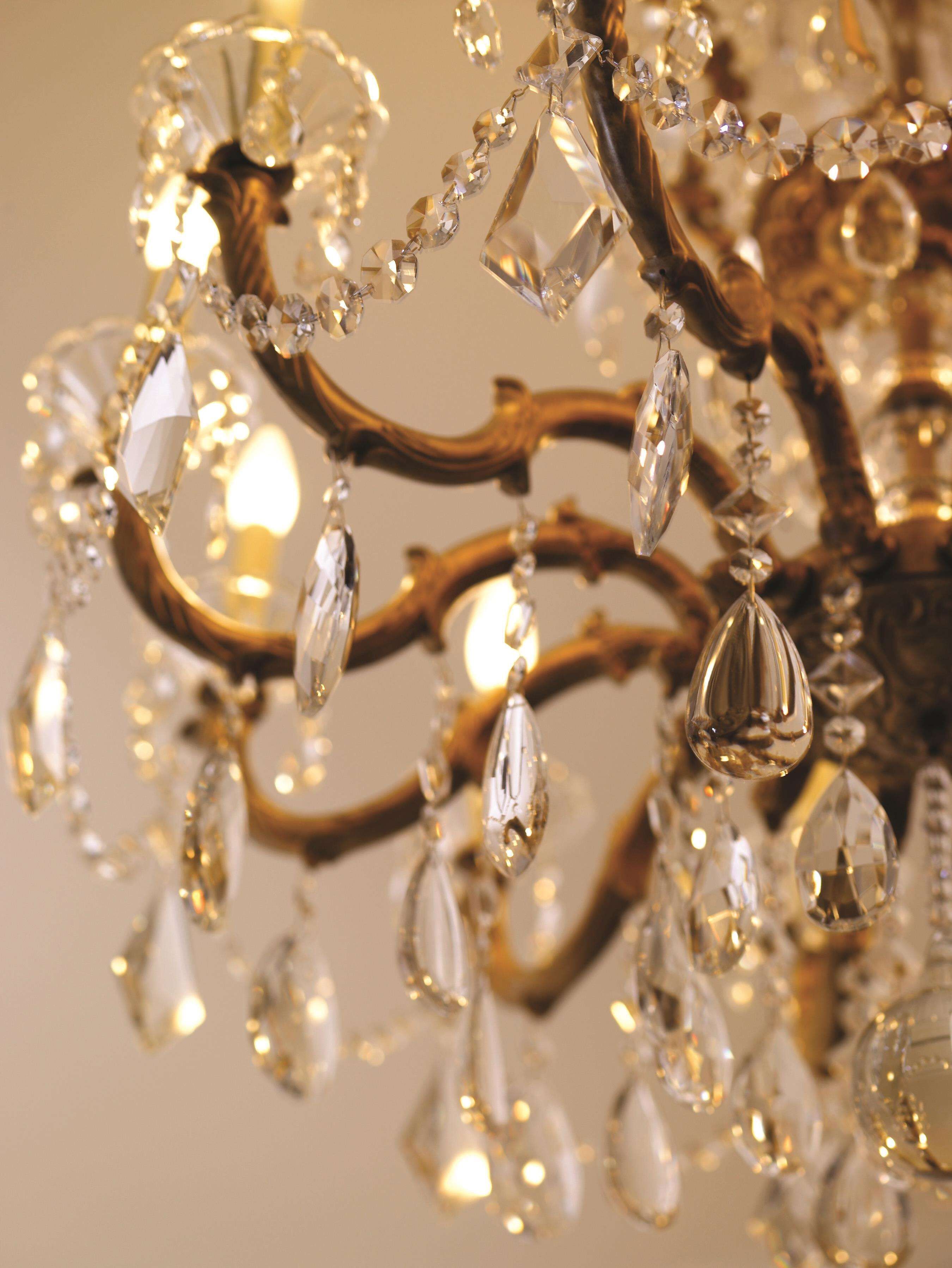 A chandelier with multiple crystal elements and branches.