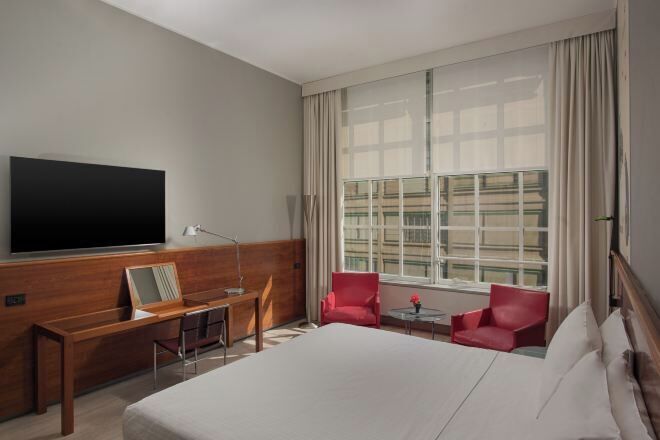 Hypo-allergenic bedding, down comforters, minibar, in-room safe