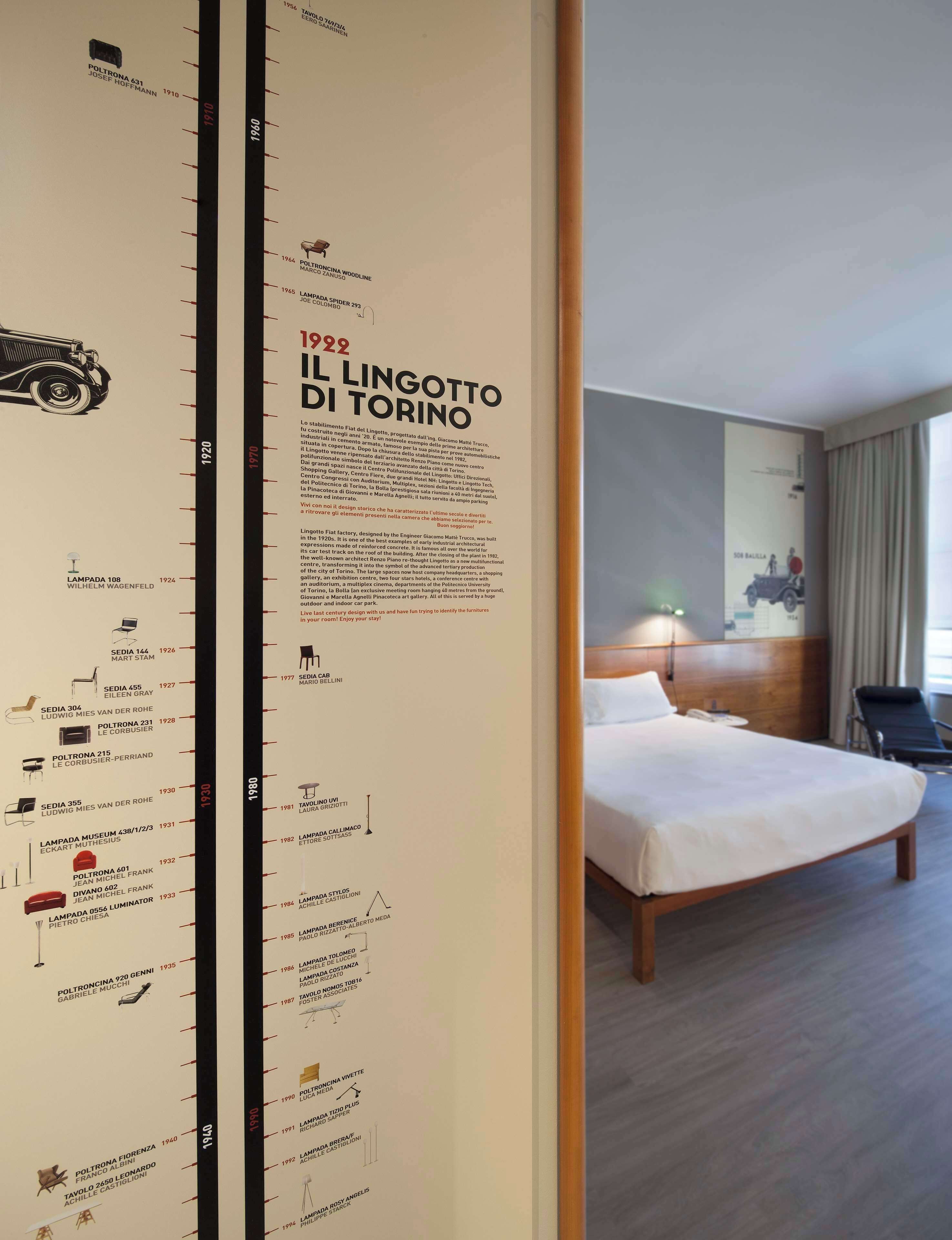 A hotel room with a large wall displaying a timeline of furniture design from 1910 to 1990.