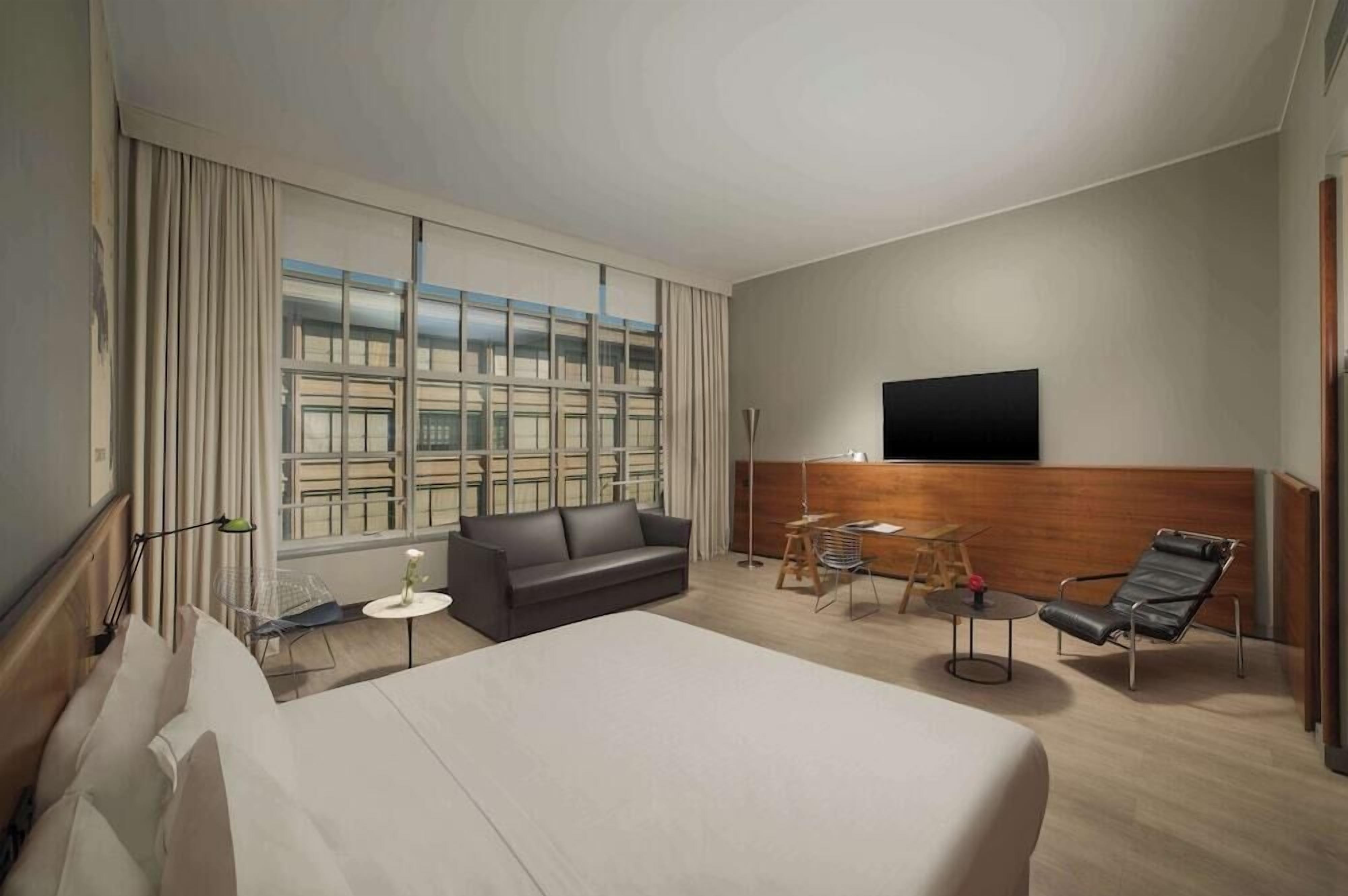 Hypo-allergenic bedding, down duvets, minibar, in-room safe