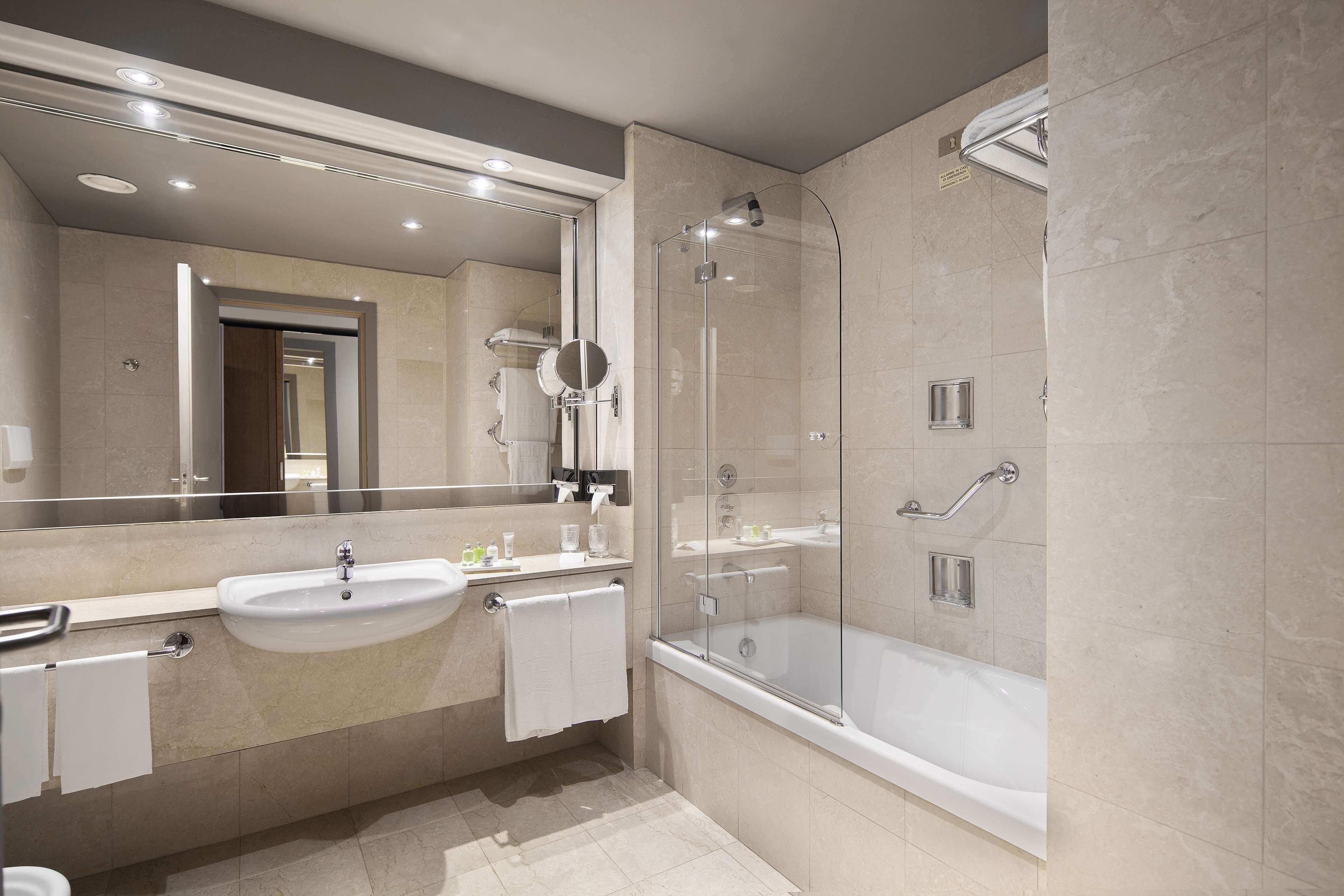 eco-friendly toiletries, hair dryer, bidet, towels