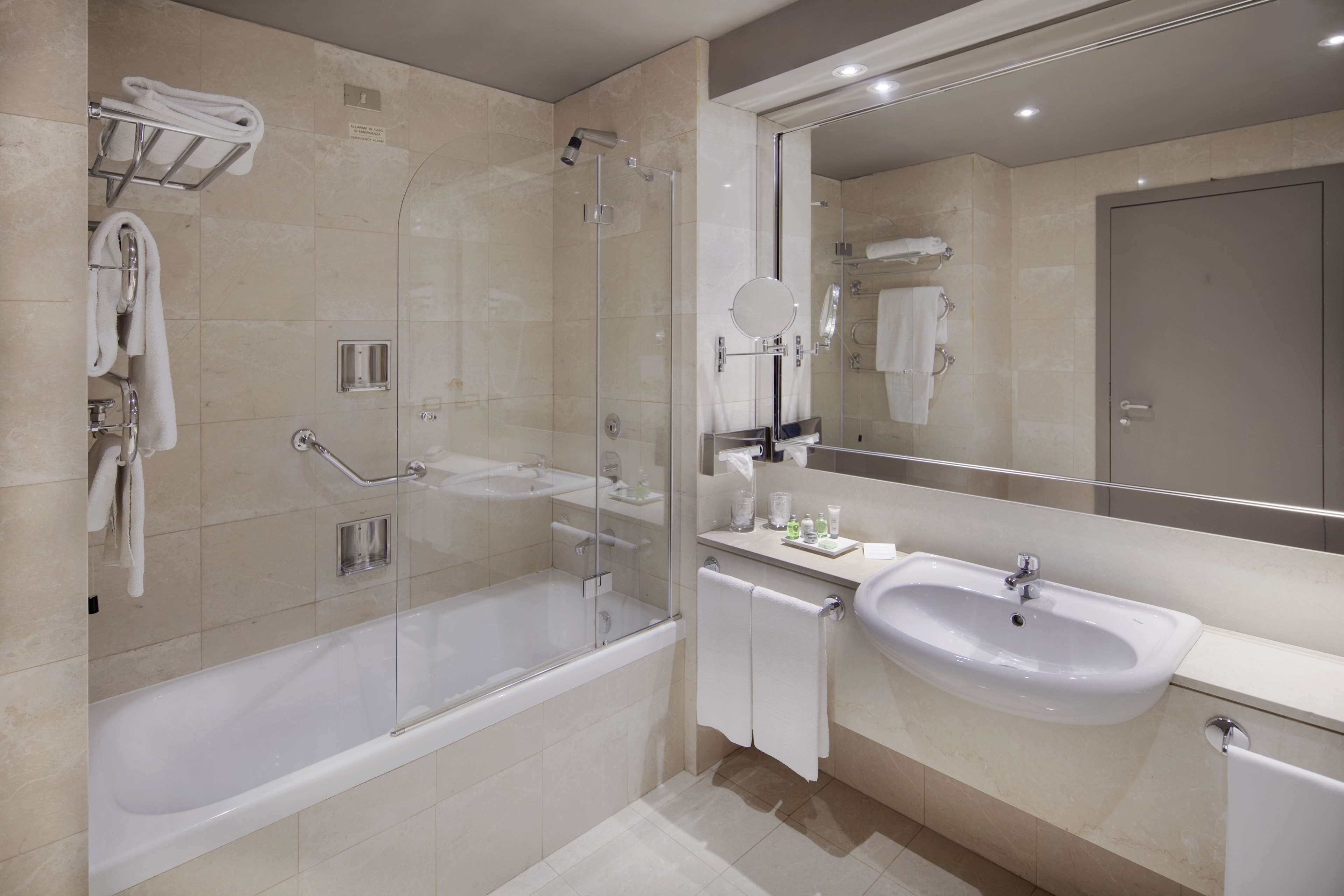 eco-friendly toiletries, hair dryer, bidet, towels