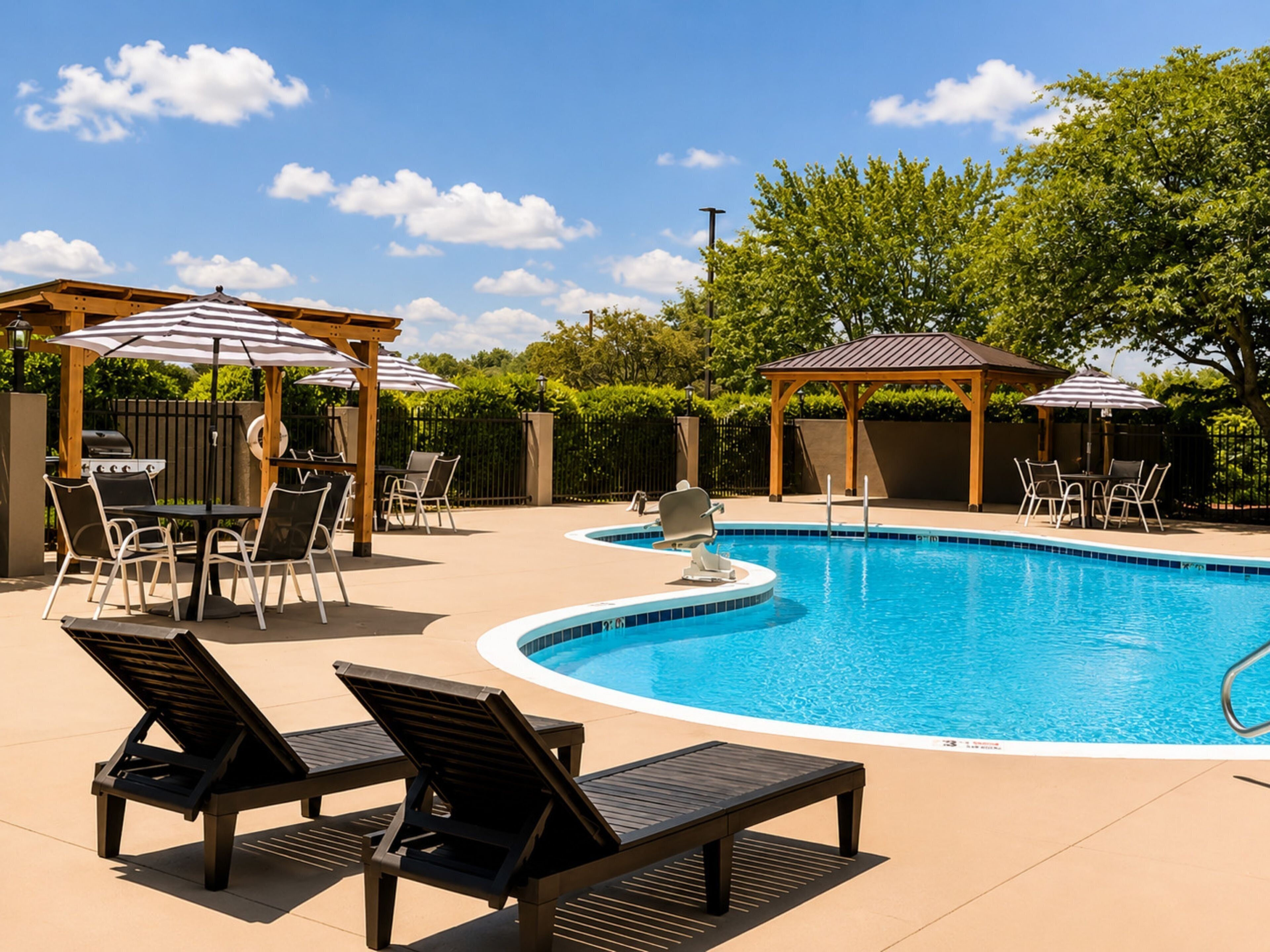 Seasonal outdoor pool, pool loungers