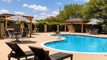 Seasonal outdoor pool, pool loungers