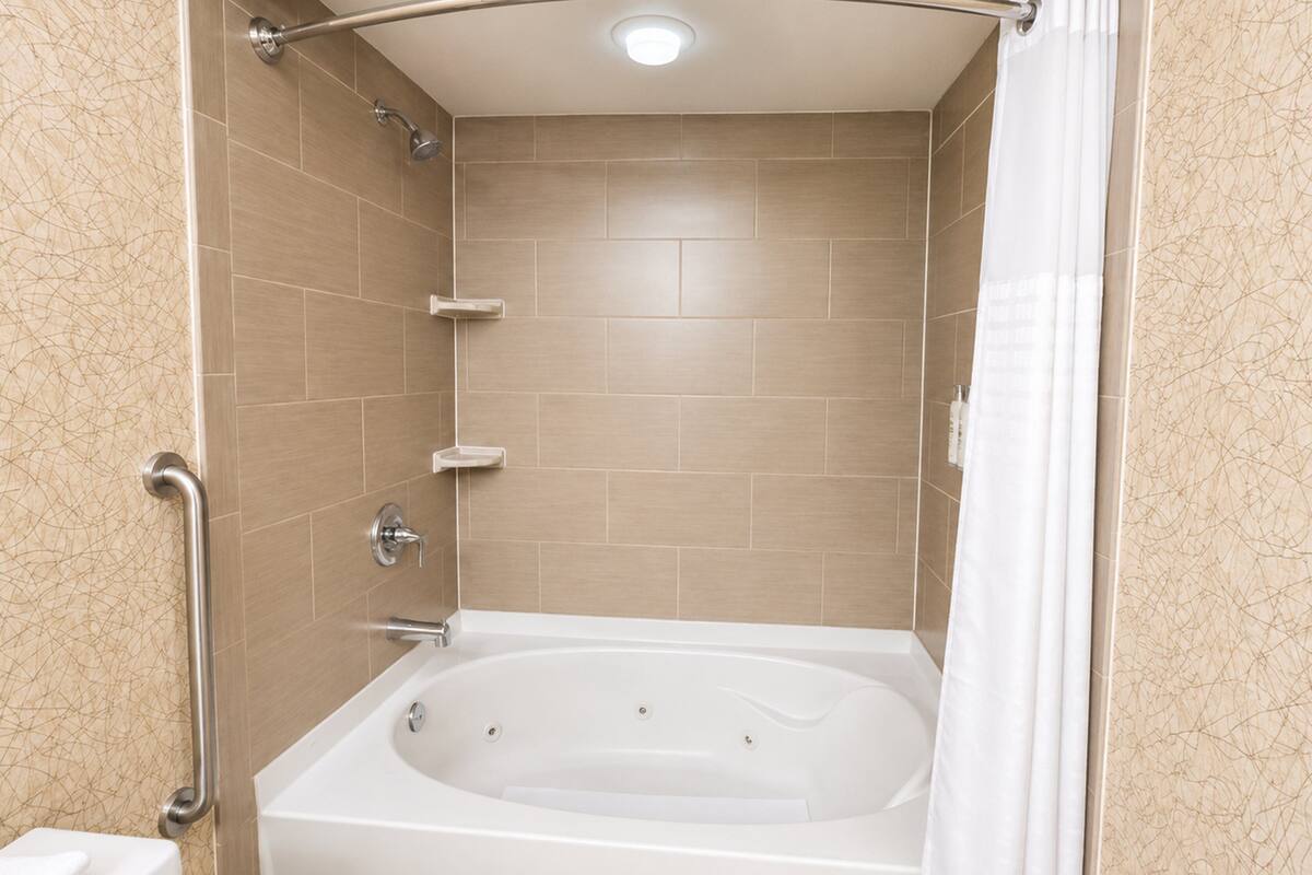 Premium Room, 1 King Bed (Garden Tub) | In-room safe, desk, iron/ironing board, cribs (free)