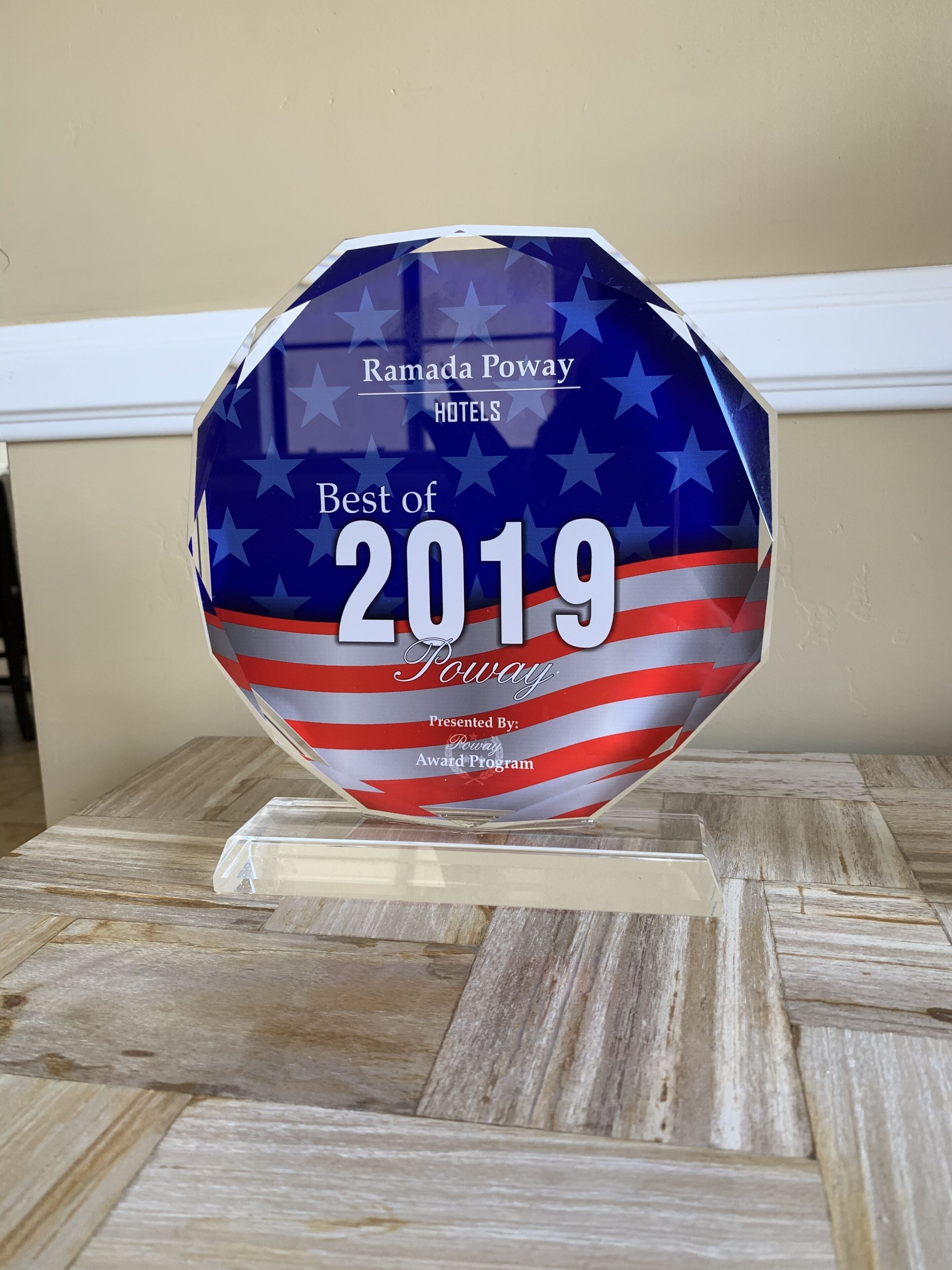 A glass award plaque for Ramada Poway Hotels' Best of 2019, presented by Poway Award Program.