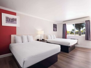 Down duvets, pillow-top beds, desk, laptop workspace