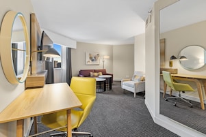 Premium bedding, Tempur-Pedic beds, desk, laptop workspace