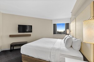 Premium bedding, Tempur-Pedic beds, desk, laptop workspace