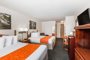Premium bedding, desk, laptop workspace, blackout curtains
