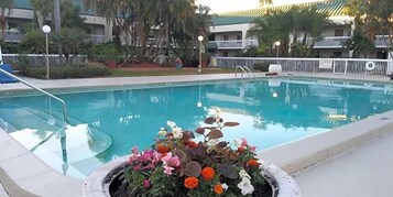 2 outdoor pools, open 10:00 AM to 10 PM, pool umbrellas, pool loungers