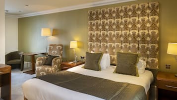 Feature Room | Individually decorated, desk, iron/ironing board, cribs/infant beds