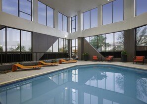 Indoor pool, open 11:00 AM to 11:00 PM, pool loungers