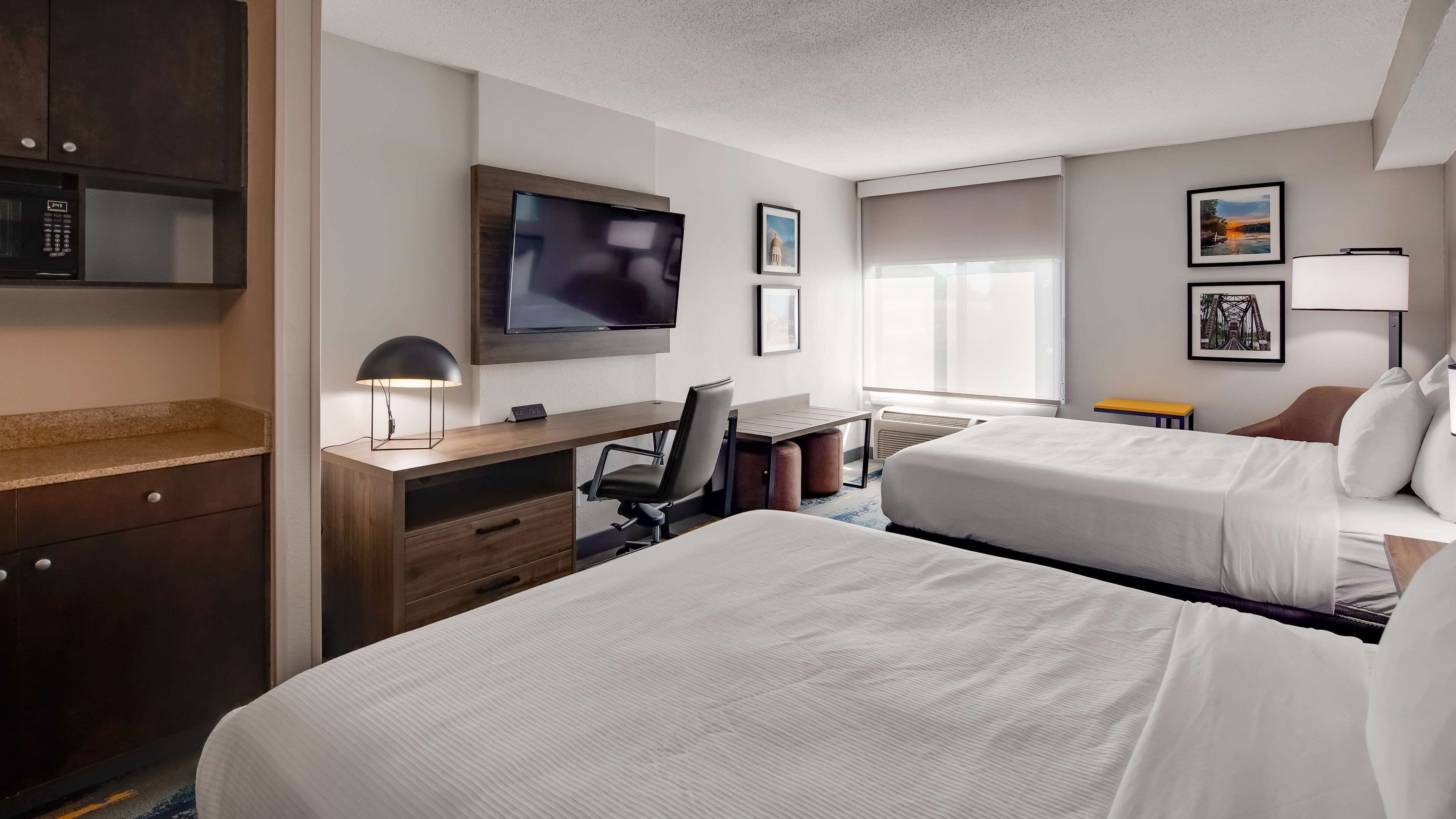 standard room, 2 queen beds, non smoking, refrigerator & microwave | desk, laptop workspace, blackout curtains, iron/ironing board