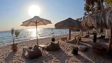 Private beach, beach umbrellas, beach towels, kayaking