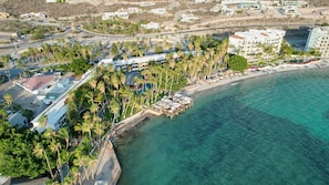 Private beach, beach umbrellas, beach towels
