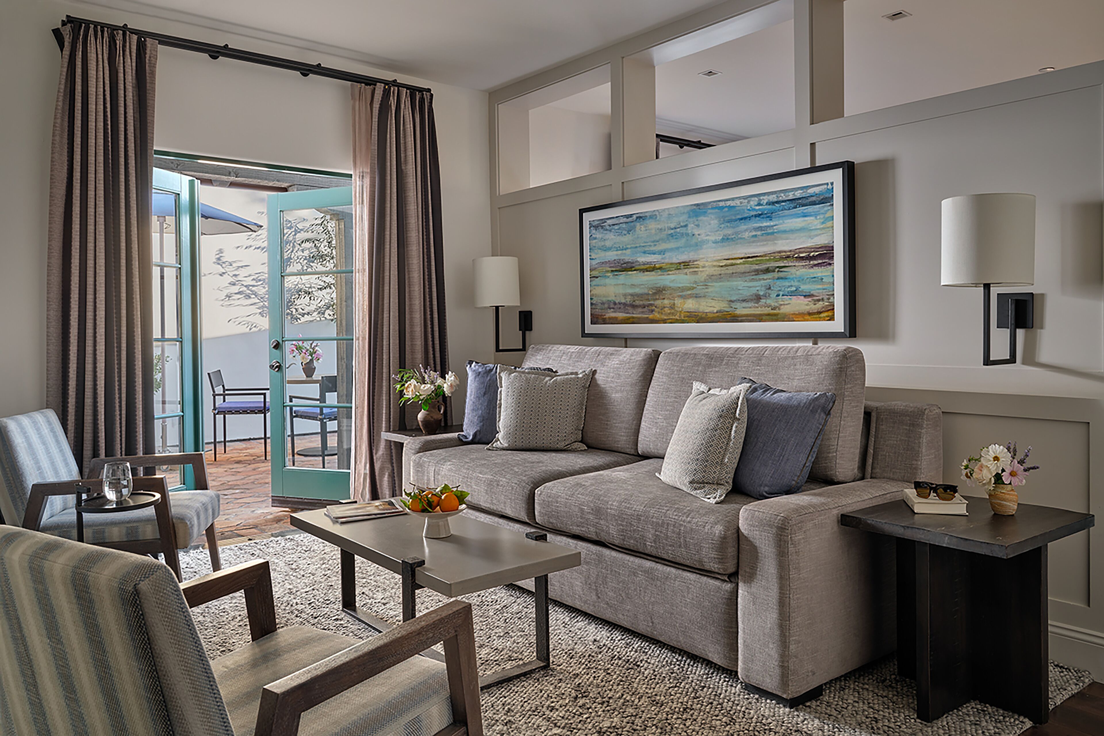 paseo suite - king bed | living area | smart tv, pay films