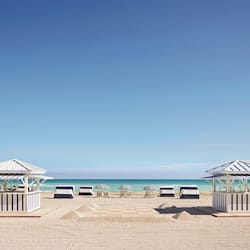 On the beach, beach cabanas, sun loungers