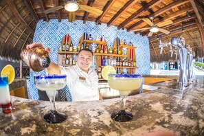 3 bars/lounges, poolside bar, beach bar