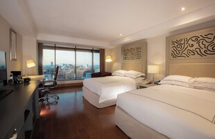 Ropa de cama de alta calidad y minibar 