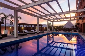 Outdoor pool, open 6:00 AM to 10:00 PM, sun loungers