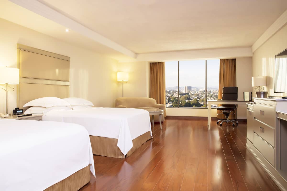 Ropa de cama de alta calidad y minibar