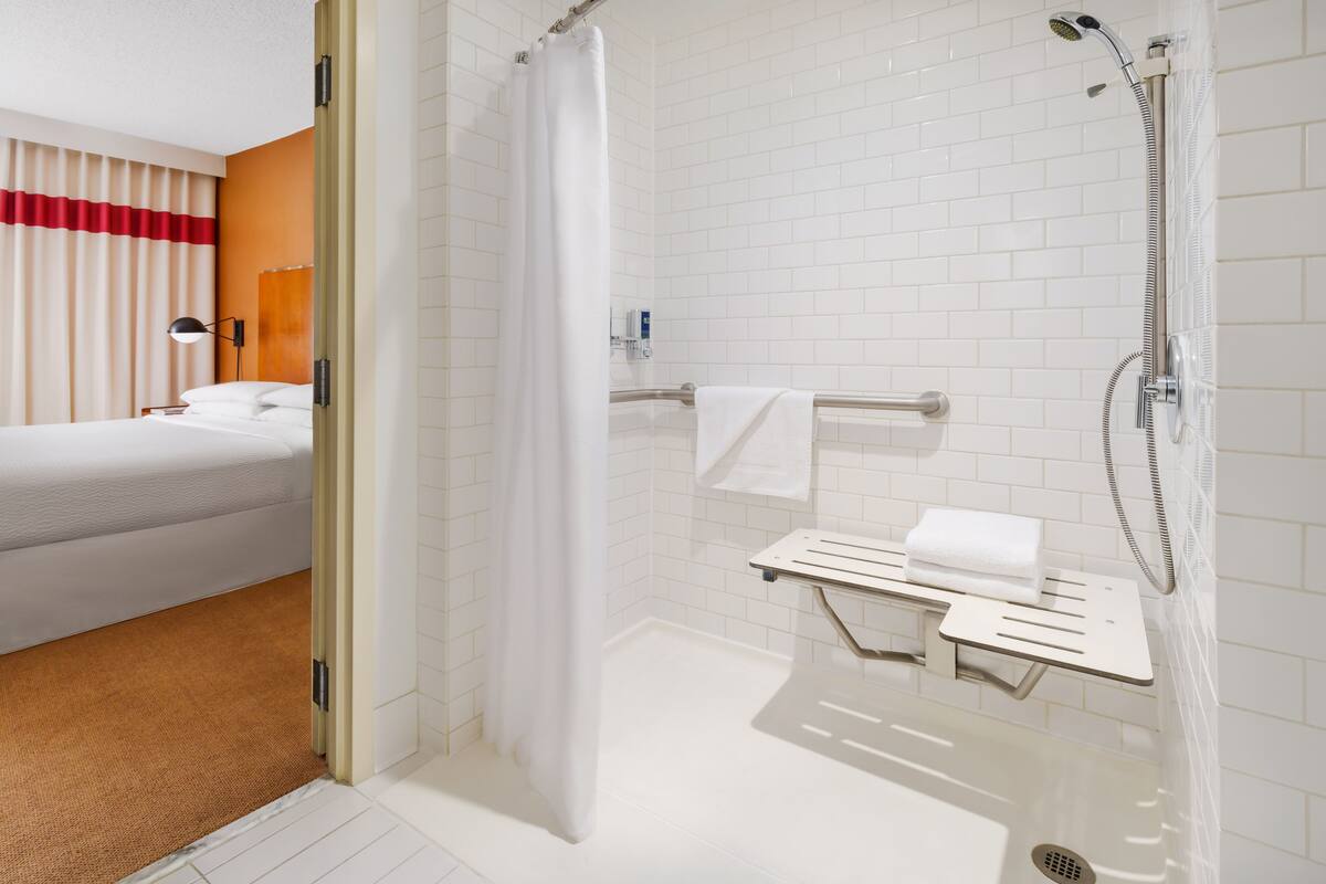 eco-friendly toiletries, hair dryer, towels