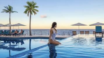 3 outdoor pools, pool umbrellas