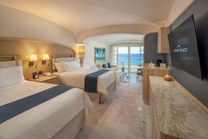 Premium bedding, pillow-top beds, free minibar, in-room safe