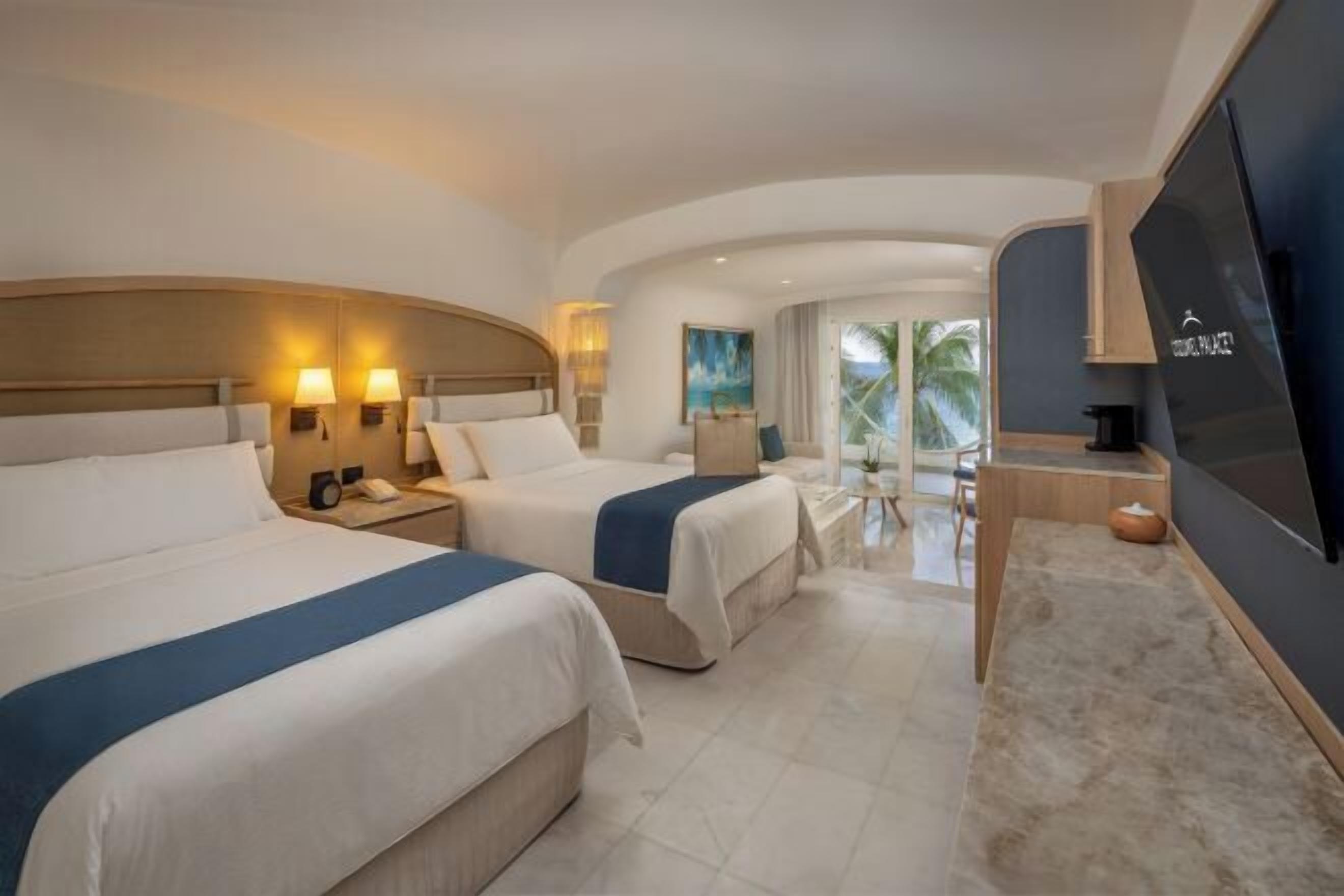 Premium bedding, pillow-top beds, free minibar, in-room safe
