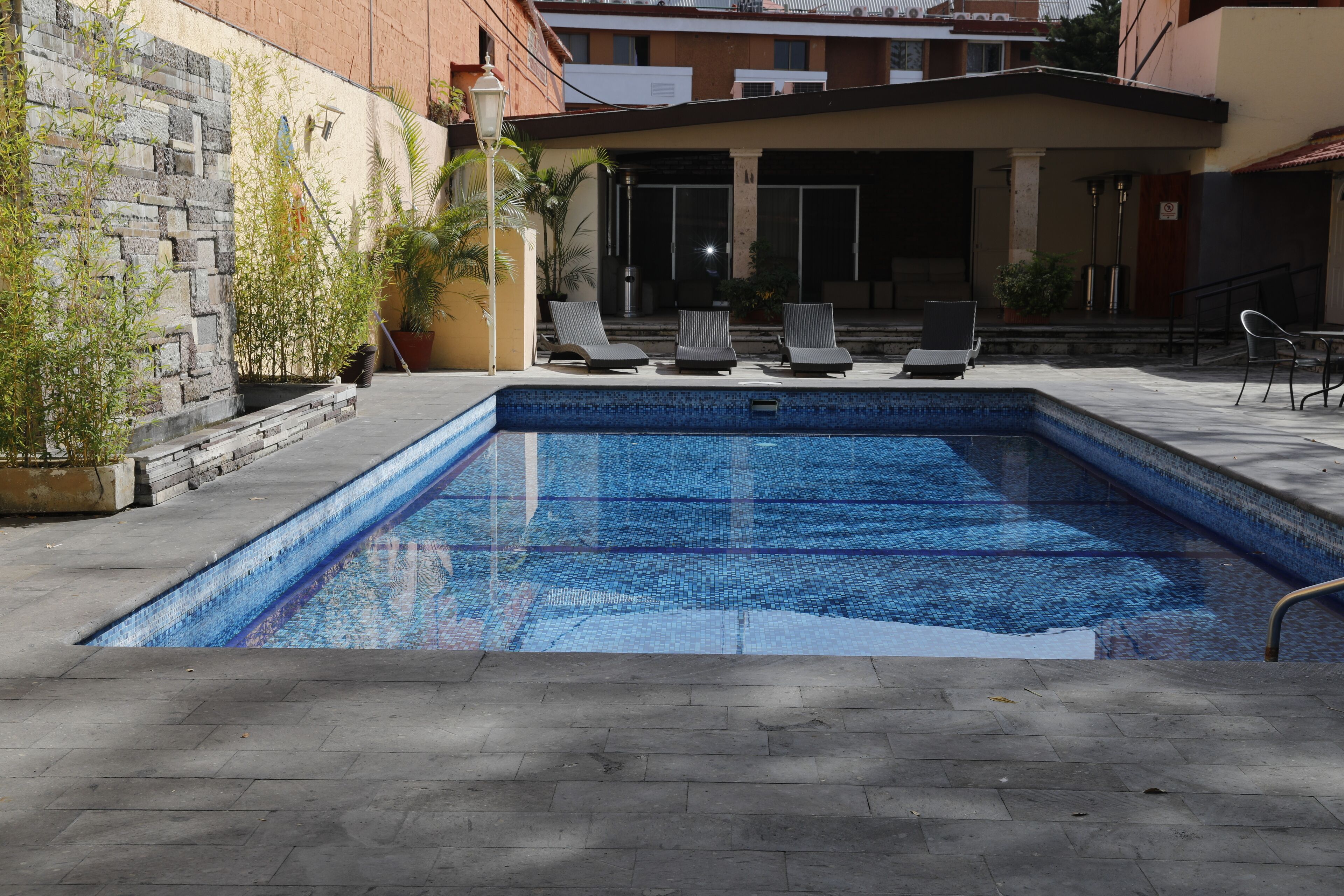 indoor pool, outdoor pool, open 9 am to 9 pm, pool loungers