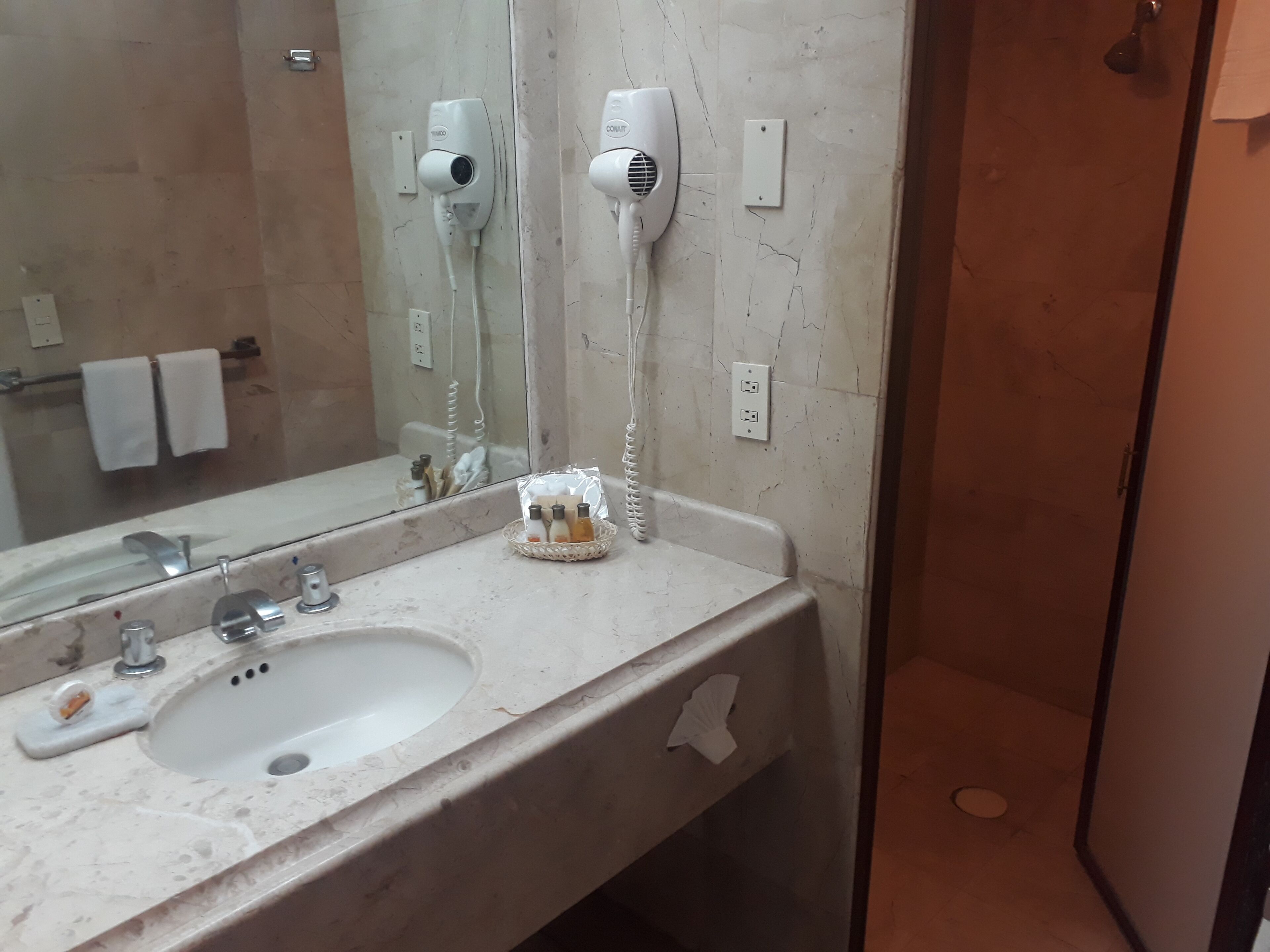 shower, free toiletries, hair dryer, towels