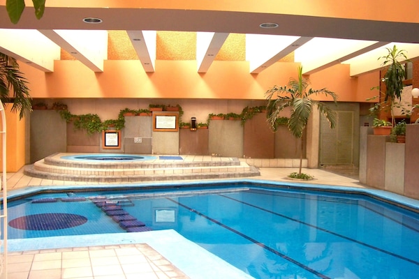 Indoor pool, outdoor pool, open 9 AM to 9 PM, sun loungers