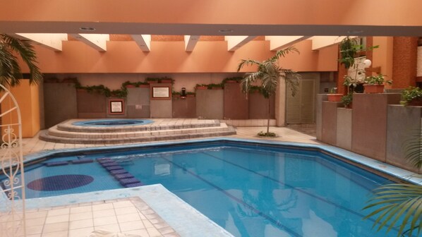 Indoor pool, outdoor pool, open 9 AM to 9 PM, sun loungers