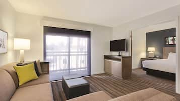 Down comforters, desk, blackout drapes, iron/ironing board