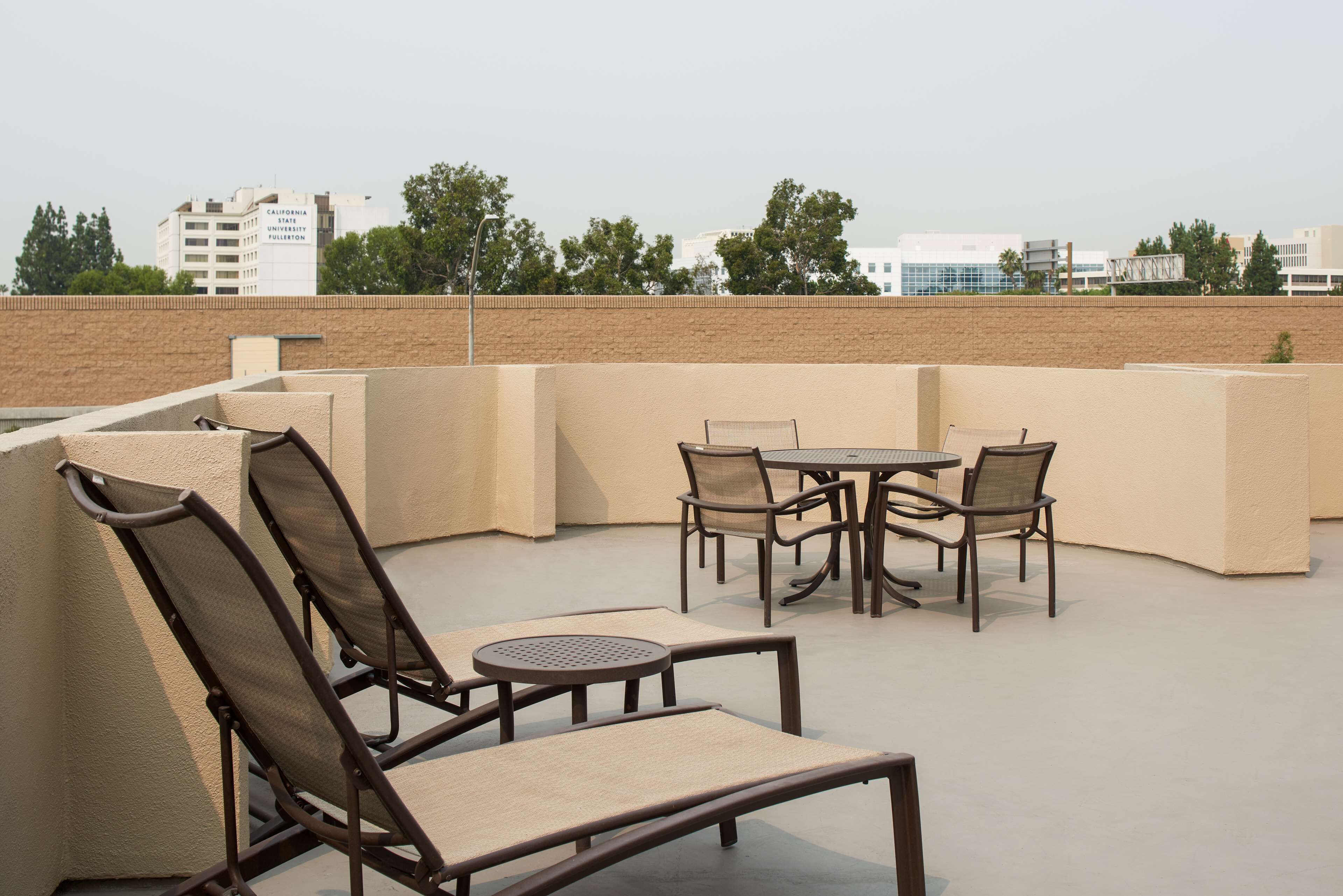 suite, 1 king bed, balcony | 1 bedroom, in-room safe, desk, laptop workspace