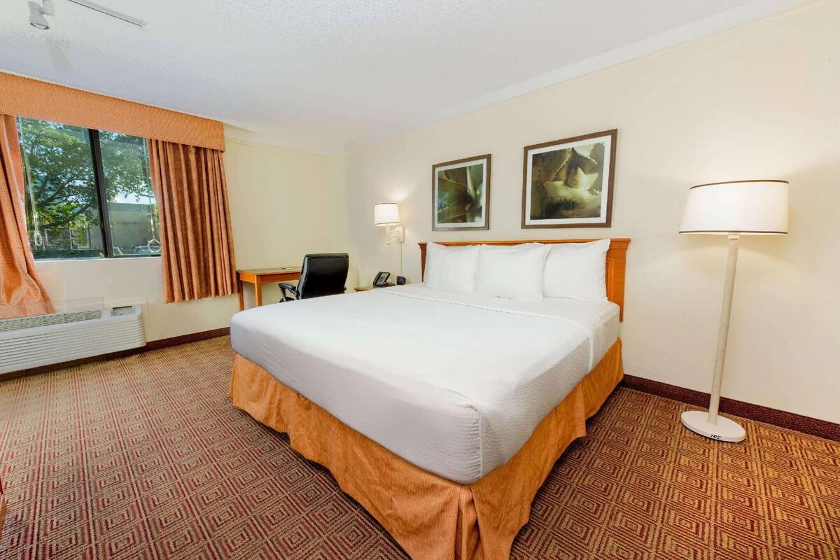 Pillowtop beds, desk, blackout drapes, iron/ironing board