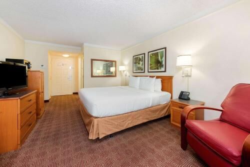 Pillowtop beds, desk, blackout drapes, iron/ironing board