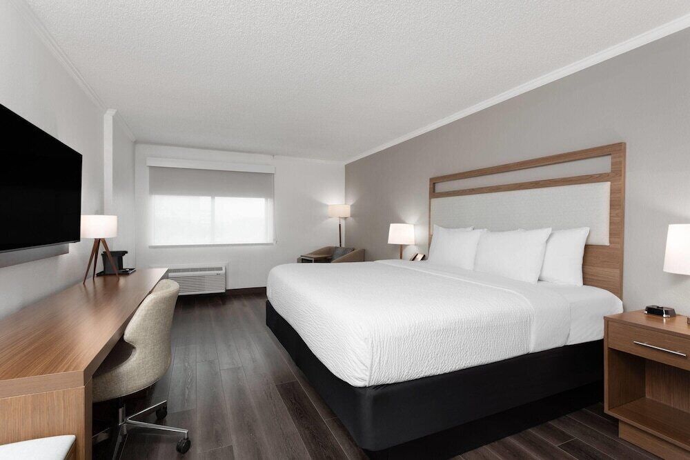 Pillowtop beds, desk, blackout drapes, iron/ironing board