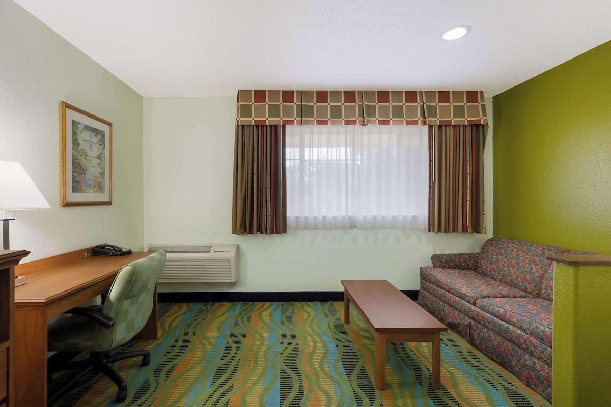 suite, 1 queen bed with sofa bed, non smoking | premium bedding, in-room safe, blackout curtains, iron/ironing board