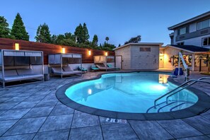 Outdoor pool, open 9:00 AM to 10:00 PM, free cabanas, pool umbrellas