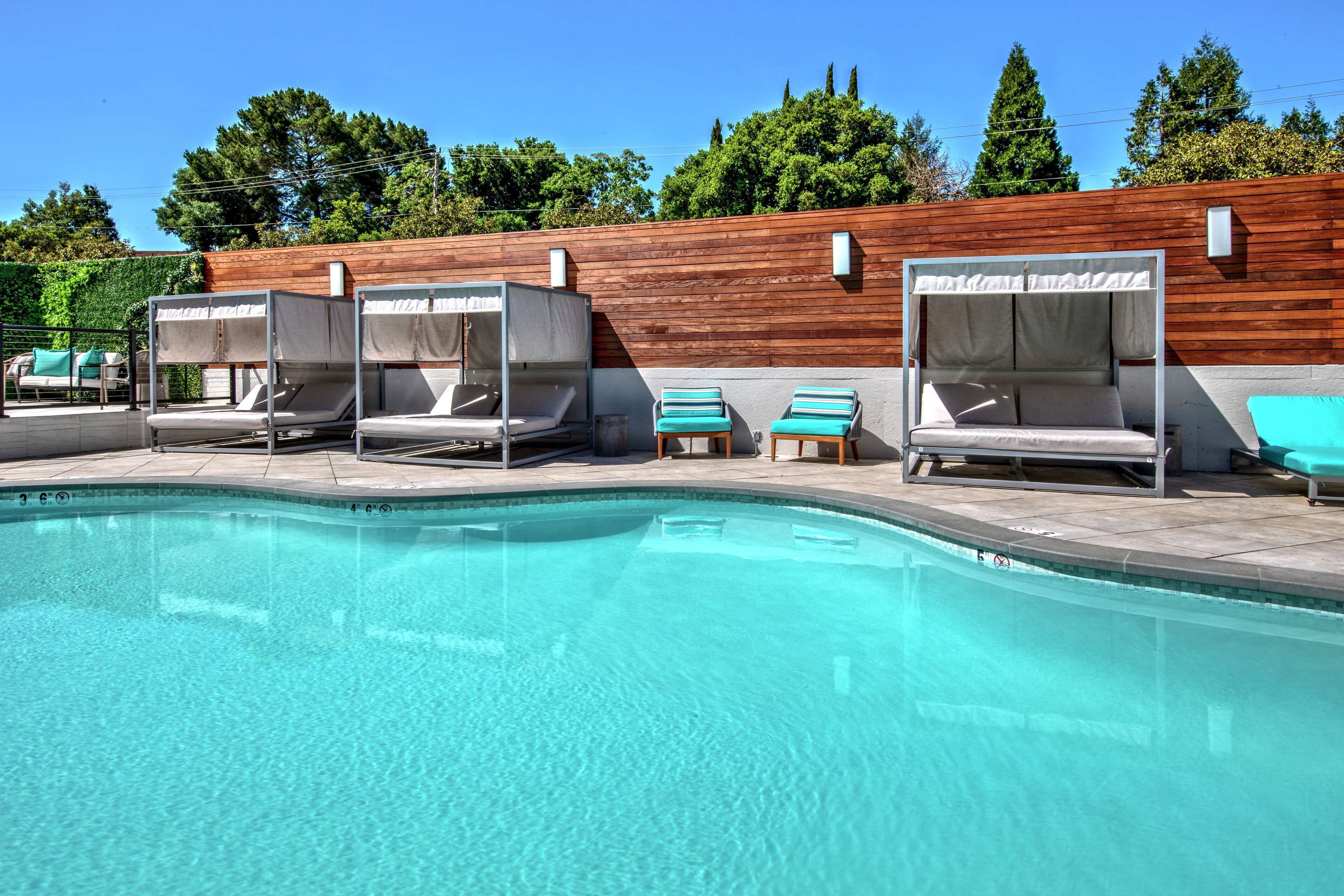 outdoor pool, open 9:00 am to 10:00 pm, free pool cabanas