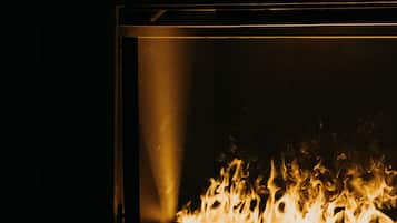 A fireplace with visible flames.