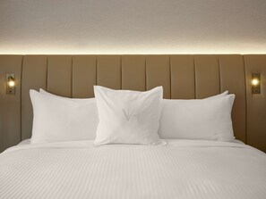 Premium bedding, down duvets, Select Comfort beds, minibar