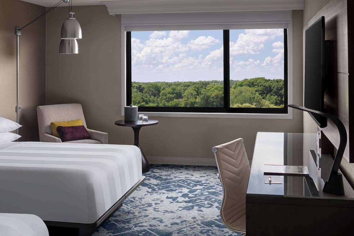 Premium bedding, pillowtop beds, desk, laptop workspace