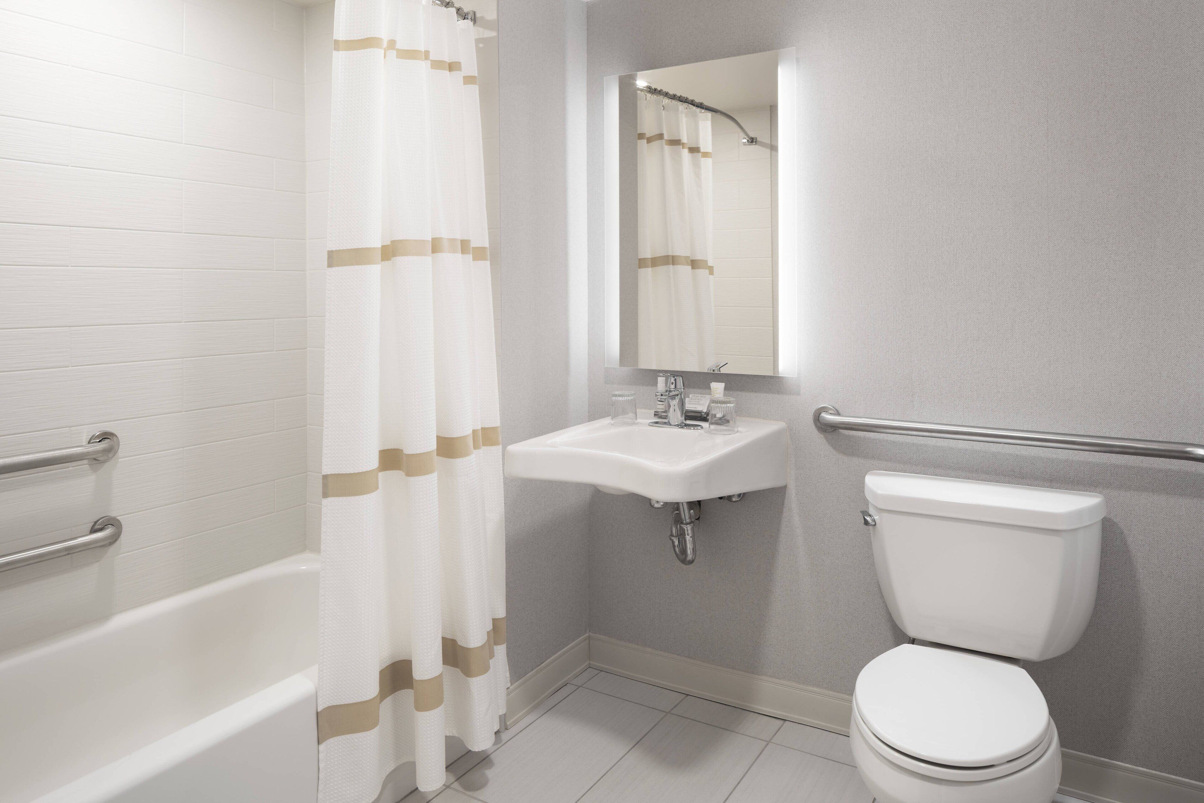 room, 1 king bed, non smoking (mobility accessible, tub) | bathroom | combined shower/bathtub, free toiletries, hair dryer, towels