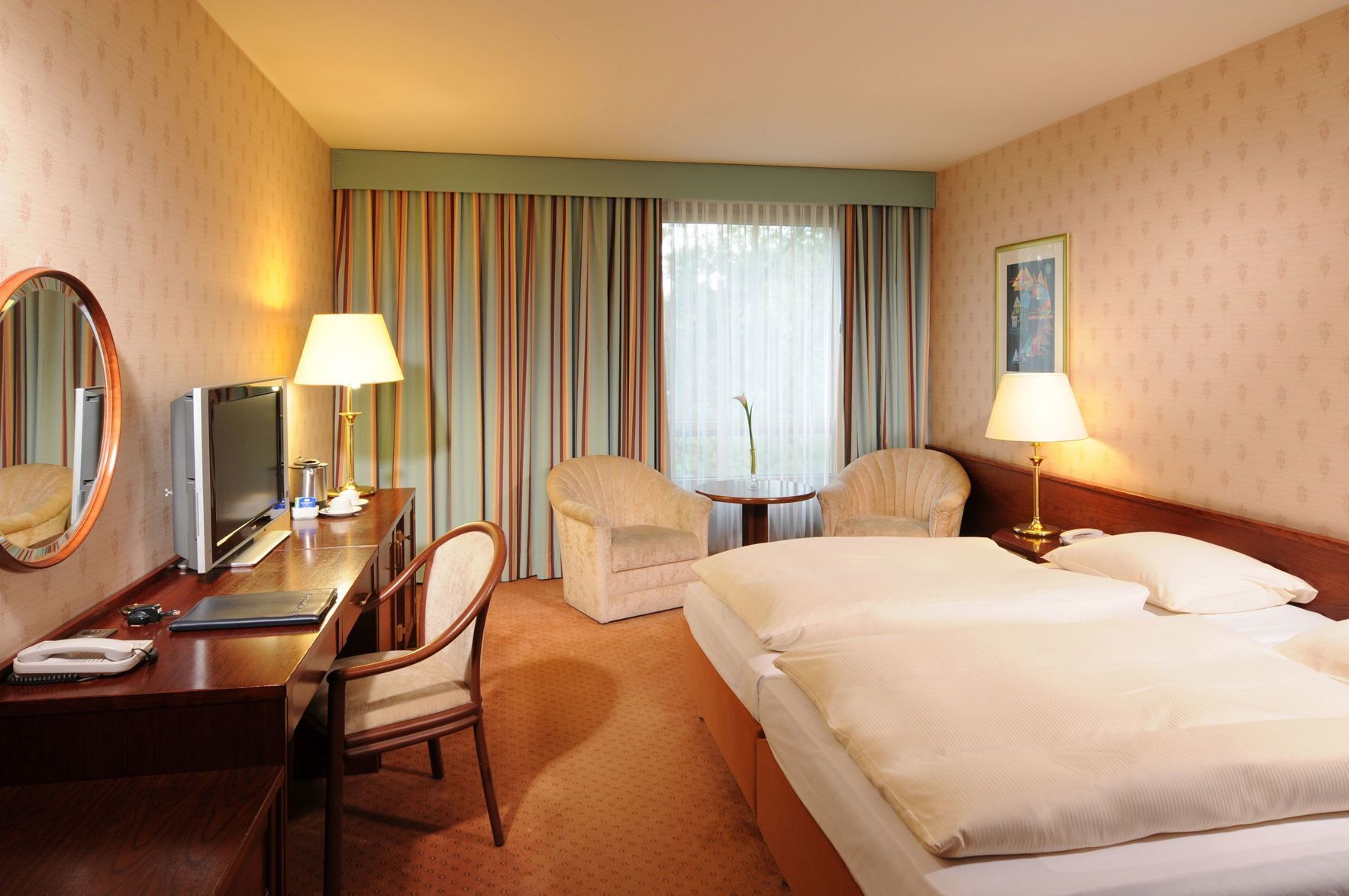 Hypo-allergenic bedding, in-room safe, desk, blackout drapes