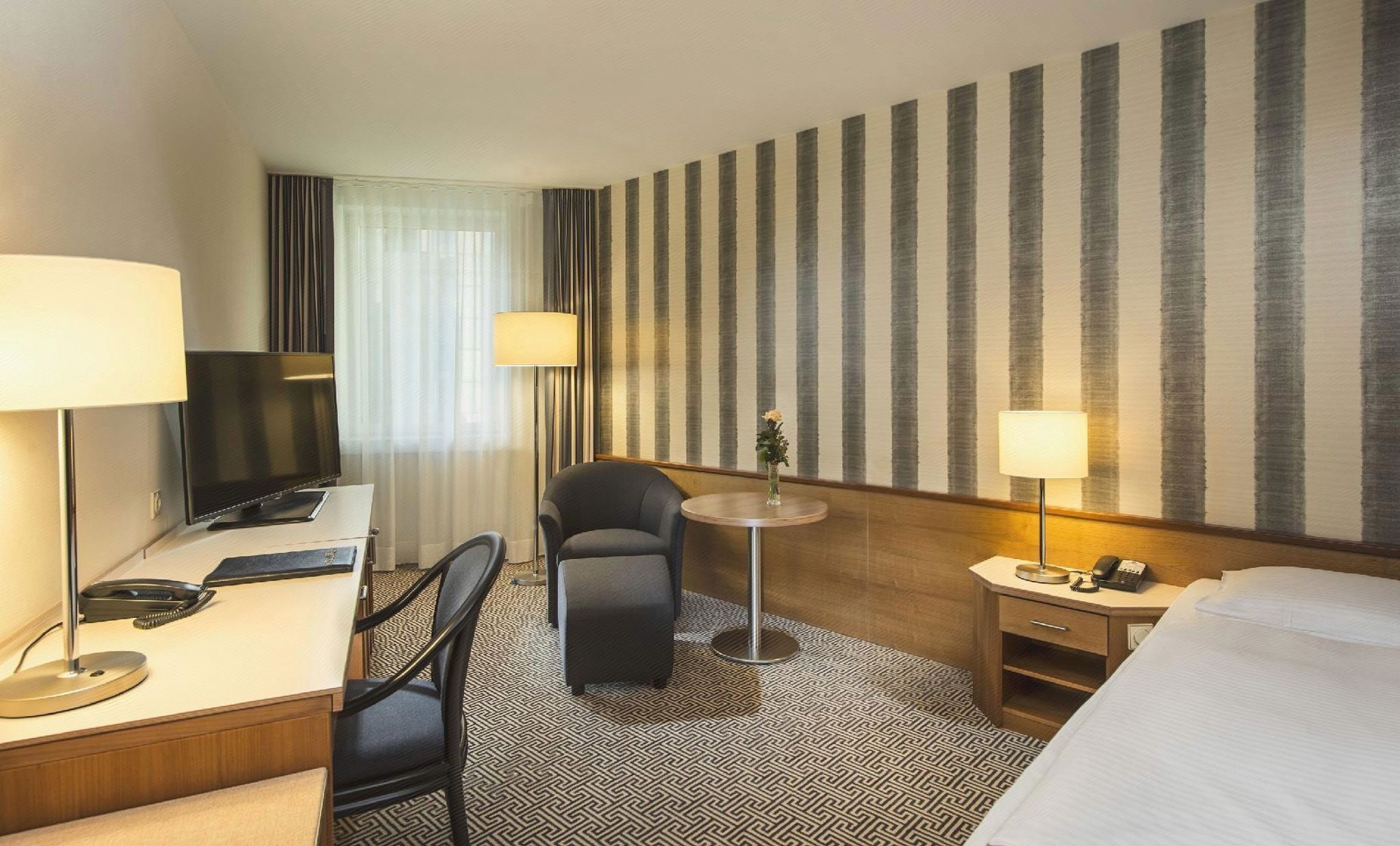 Ropa de cama de alta calidad y minibar 