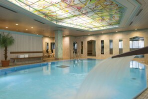 Indoor pool, open 6:00 AM to 11:00 PM, pool loungers