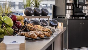 A buffet with pastries, fruits, and bowls of soup. - Maritim Hotel Magdeburg (Magdeburg)